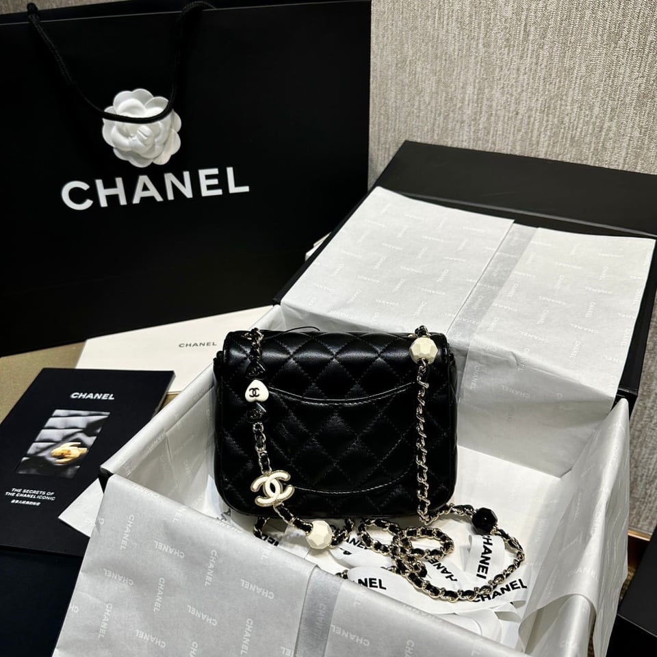 Chanel Mini Flap Bag in Black Lambskin view 8
