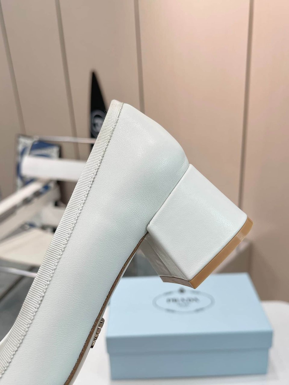 Prada Triangle Logo Bow Pump In White view 8