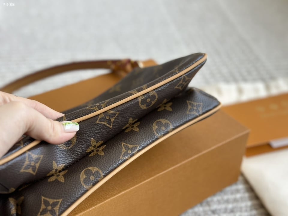 Louis Vuitton Liv Pochette Monogram Coated Canvas 20Cm M83008 view 8