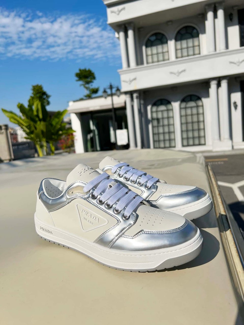 Prada District Perforated Leather Sneakers Sliver view 4