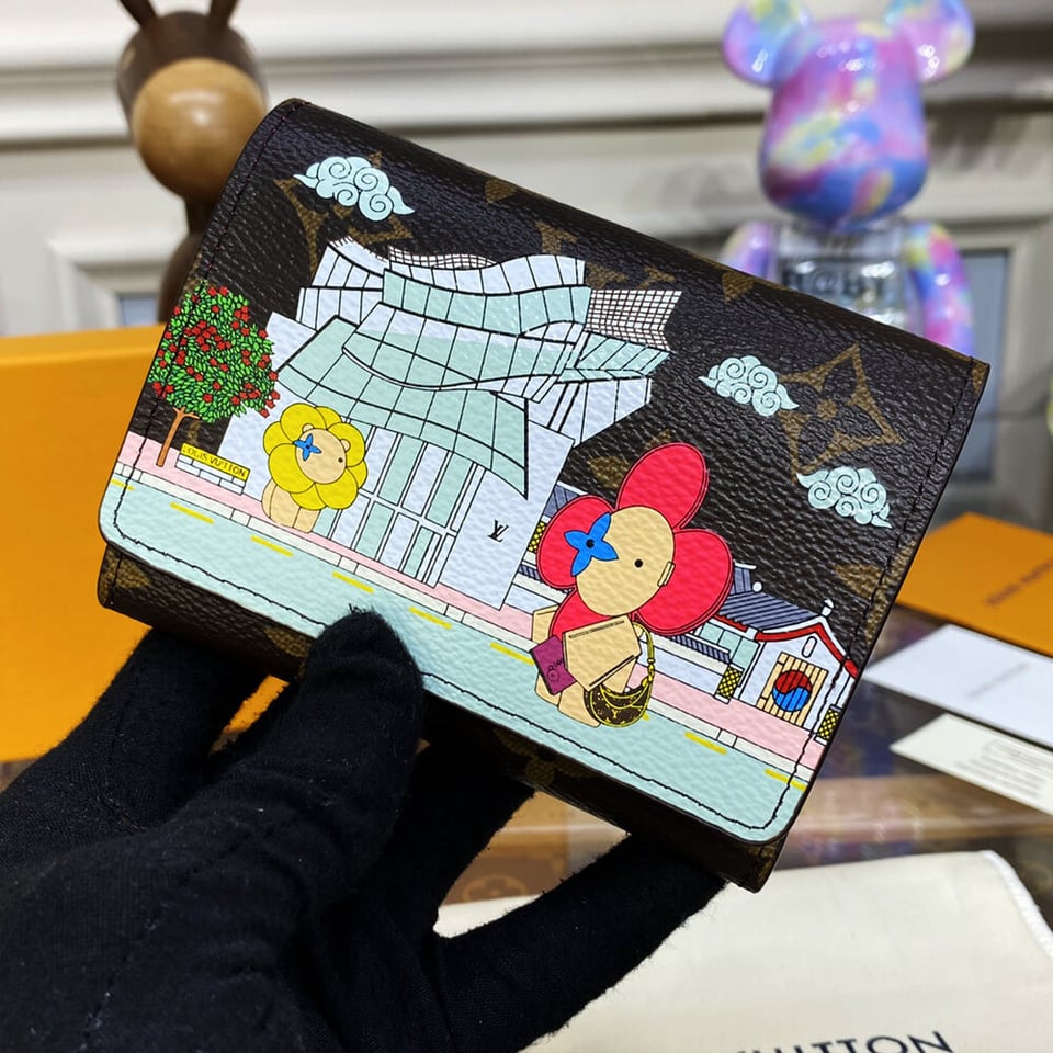 Louis Vuitton Christmas Animation 2022 Victorine Wallet Fuchsia view 5