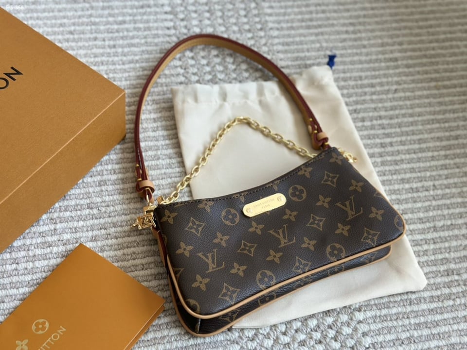 Louis Vuitton Liv Pochette Monogram Coated Canvas 20Cm M83008 view 3