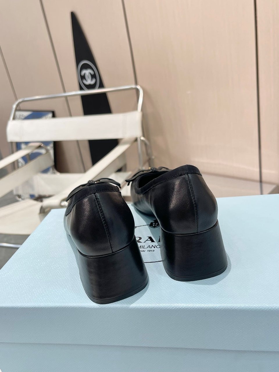 Prada Triangle Logo Bow Pump In Black view 4