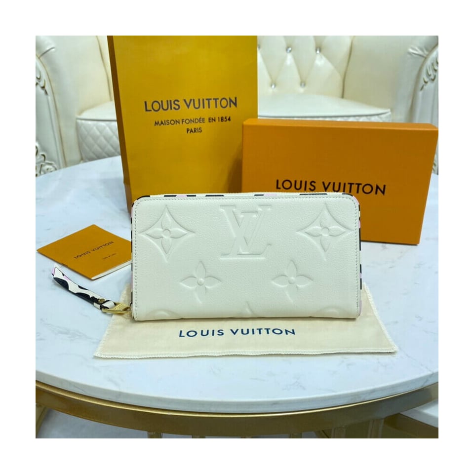 Louis Vuitton Monogram Empreinte Leather with Animal-Print Zippy Wallet Cream view 3