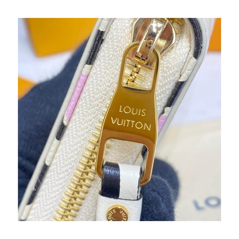 Louis Vuitton Monogram Empreinte Leather with Animal-Print Zippy Wallet Cream view 7