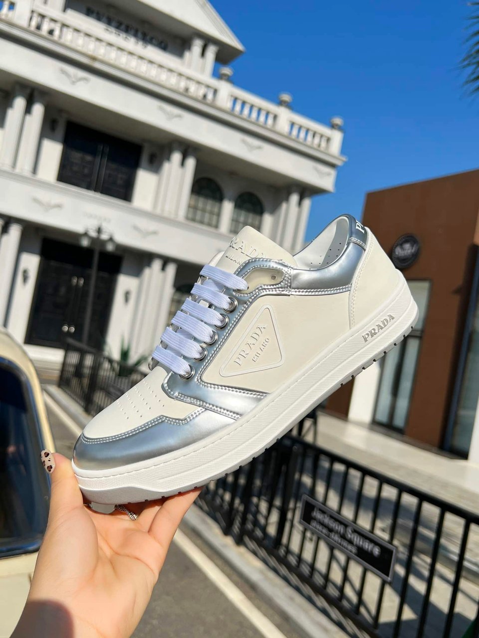 Prada District Perforated Leather Sneakers Sliver view 9
