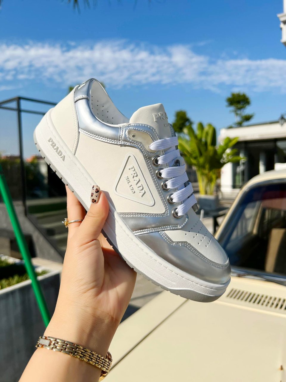 Prada District Perforated Leather Sneakers Sliver view 3
