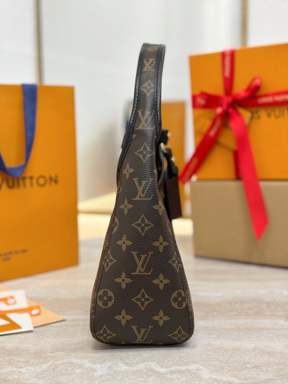 Louis Vuitton The Drop Pm Monogram Canvas M12940 view 13