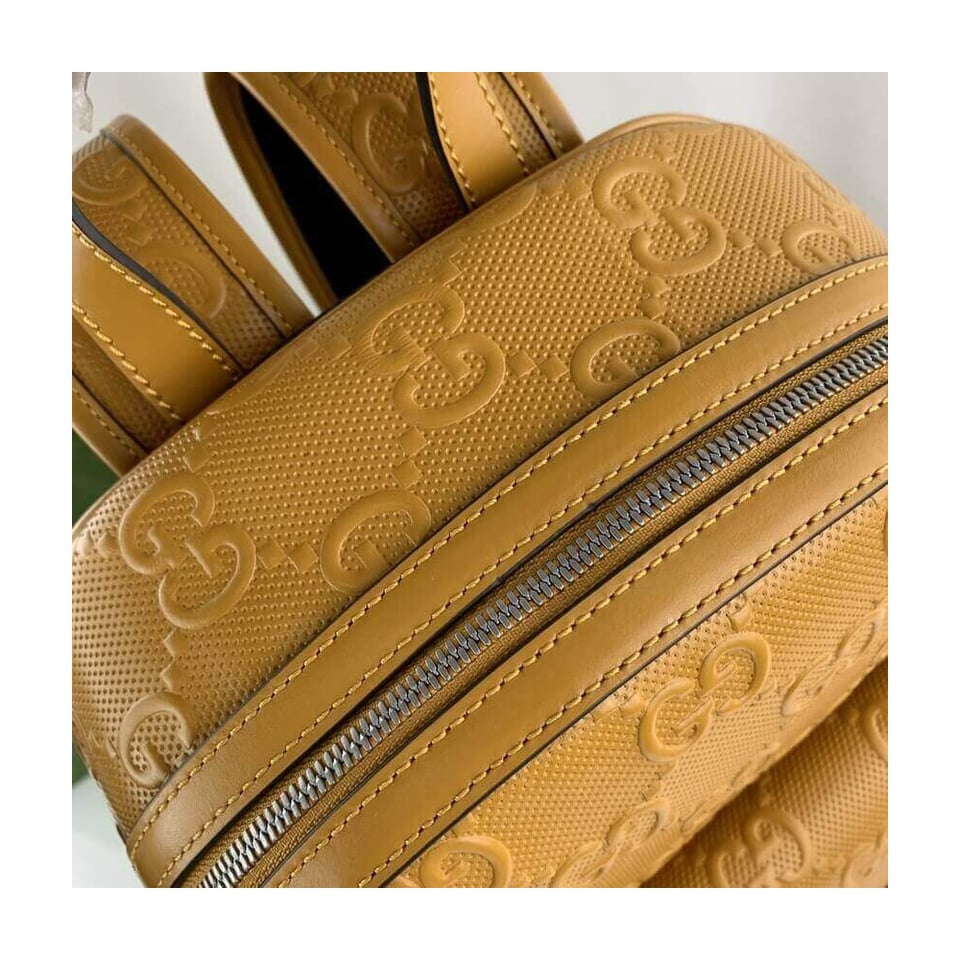 Gucci GG Embossed Backpack in Yellow Leather view 11