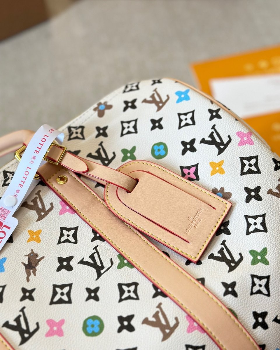 Louis Vuitton Keepall Bandouli Re Vanilla 40Cm M25233 view 7