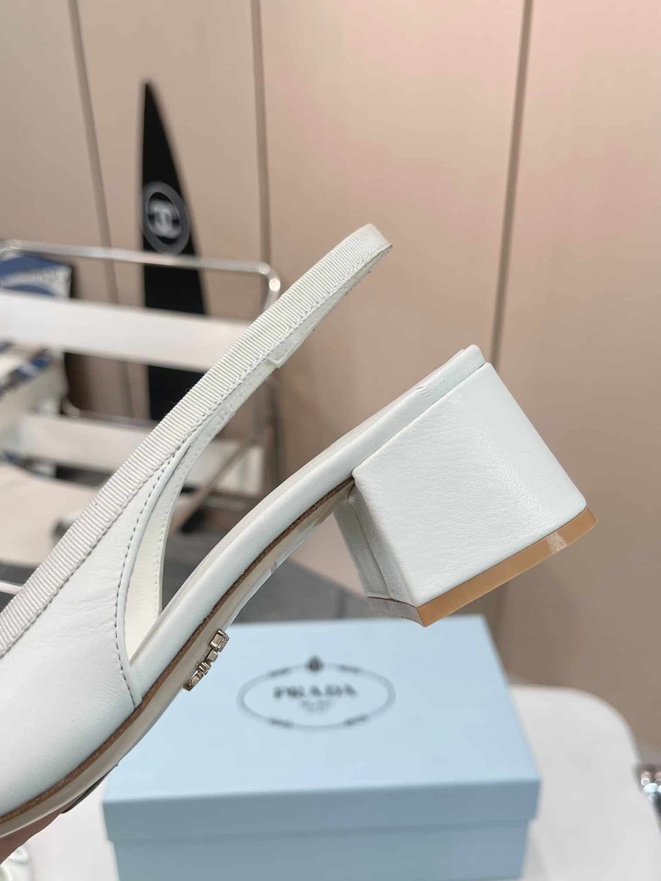 Prada Triangle Logo Bow Slingback Pump In White view 6