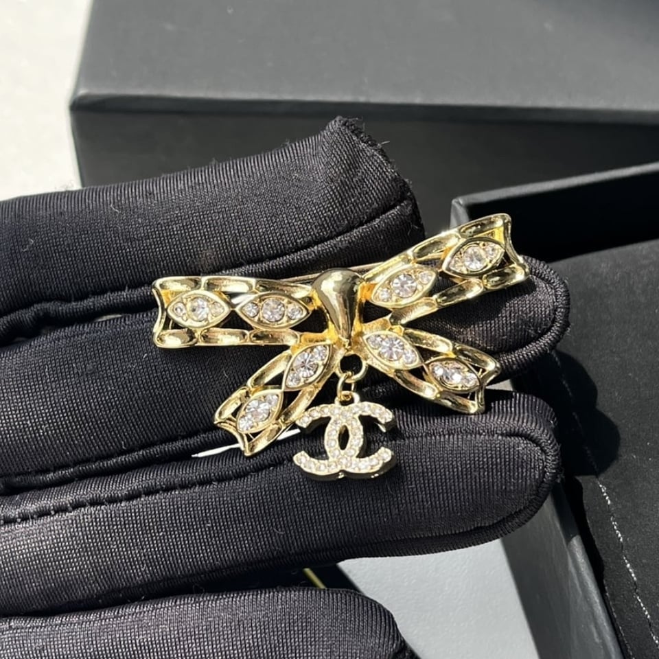 Chanel Cc Bowtie Brooch Gold view 7