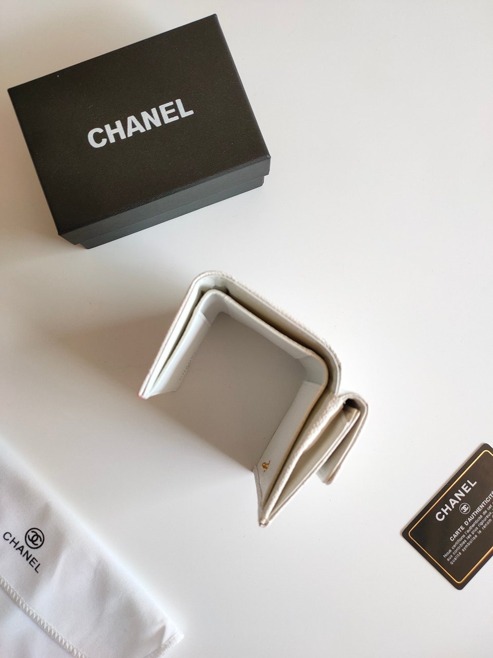 Chanel Trifold Purse 12 White Grained Calfskin Gold Icon view 10