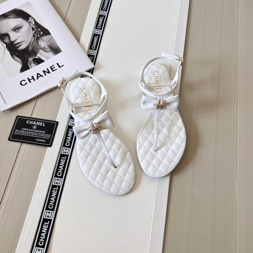 Chanel White Quilted Leather With White Camellia Cc Logo Bow Thong Sandals view 11