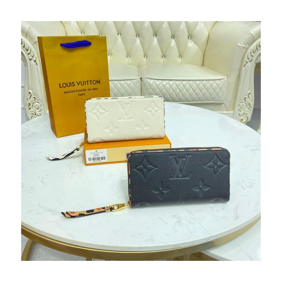 Louis Vuitton Monogram Empreinte Leather with Animal-Print Zippy Wallet Cream view 12