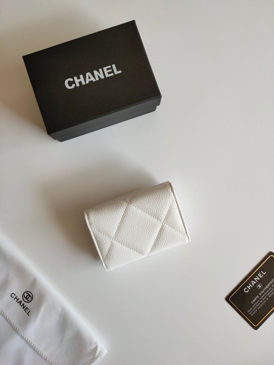 Chanel Trifold Purse 12 White Grained Calfskin Gold Icon view 9