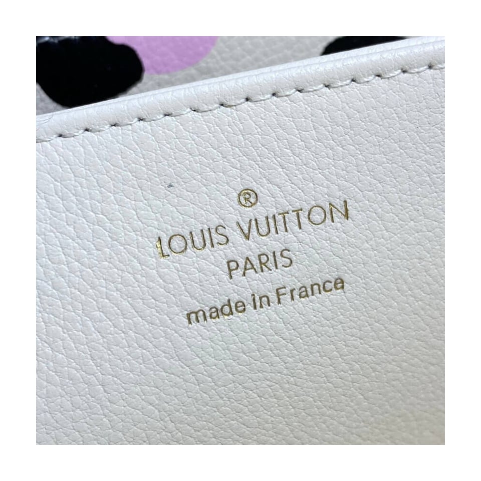 Louis Vuitton Monogram Empreinte Leather with Animal-Print Zippy Wallet Cream view 9