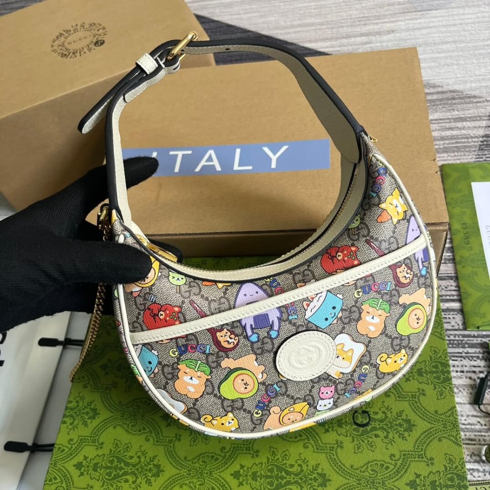 Gucci Half-Moon-Shaped Mini Bag with Interlocking G Animal Print view 10