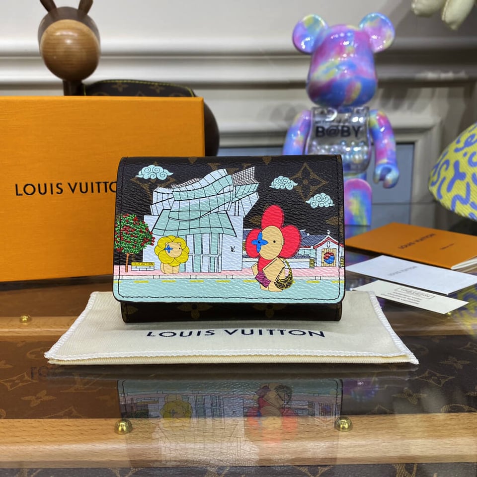 Louis Vuitton Christmas Animation 2022 Victorine Wallet Fuchsia view 3