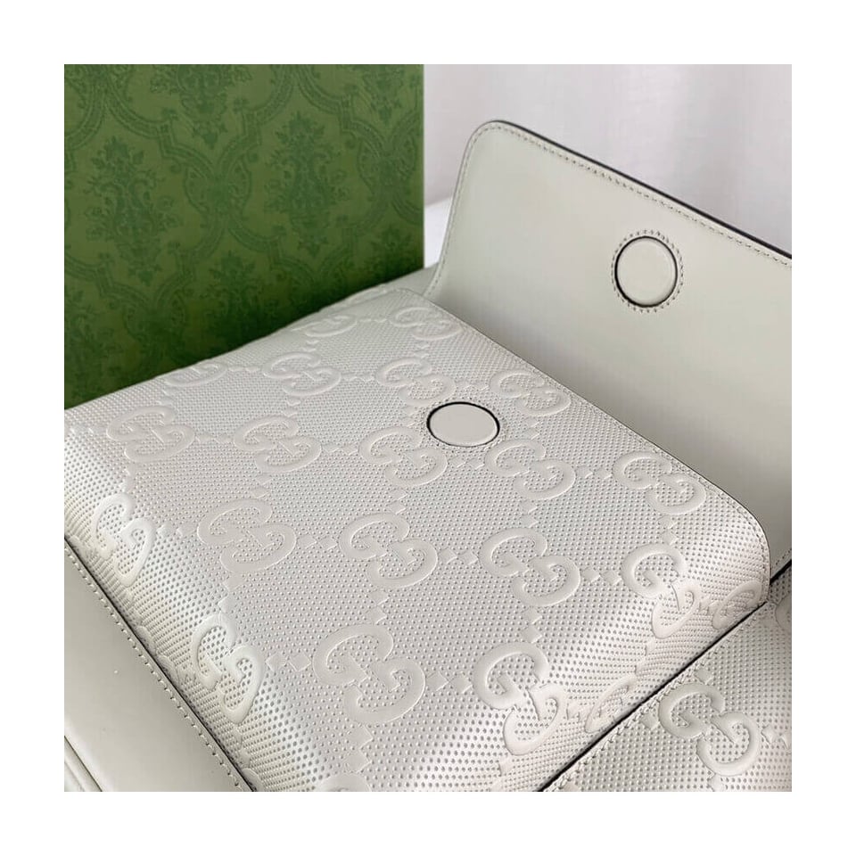 Gucci GG Embossed Backpack in White Leather view 9