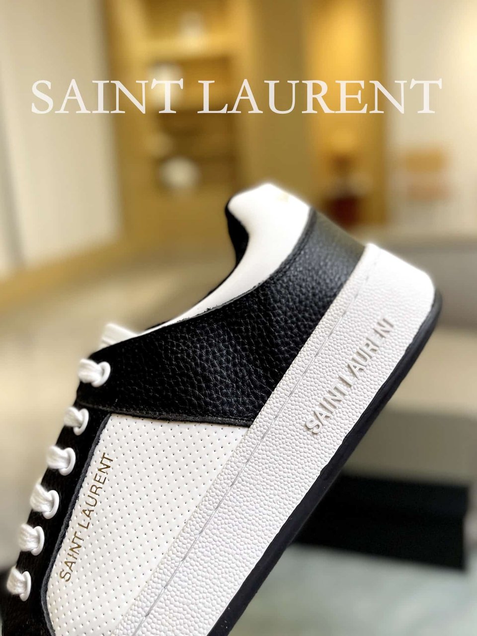 Saint Laurent Perforated Leather Sneakers Black And White view 4