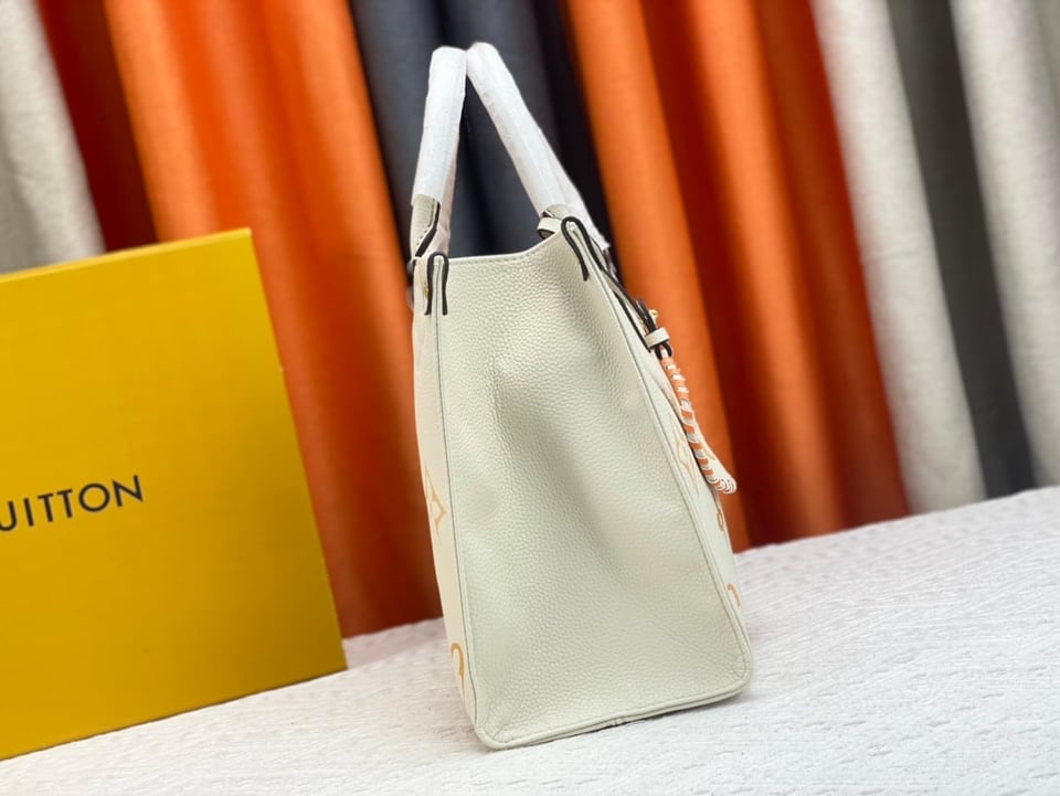Louis Vuitton On The Go Mm Monogram Empreinte Leather White 34Cm M45717 view 6