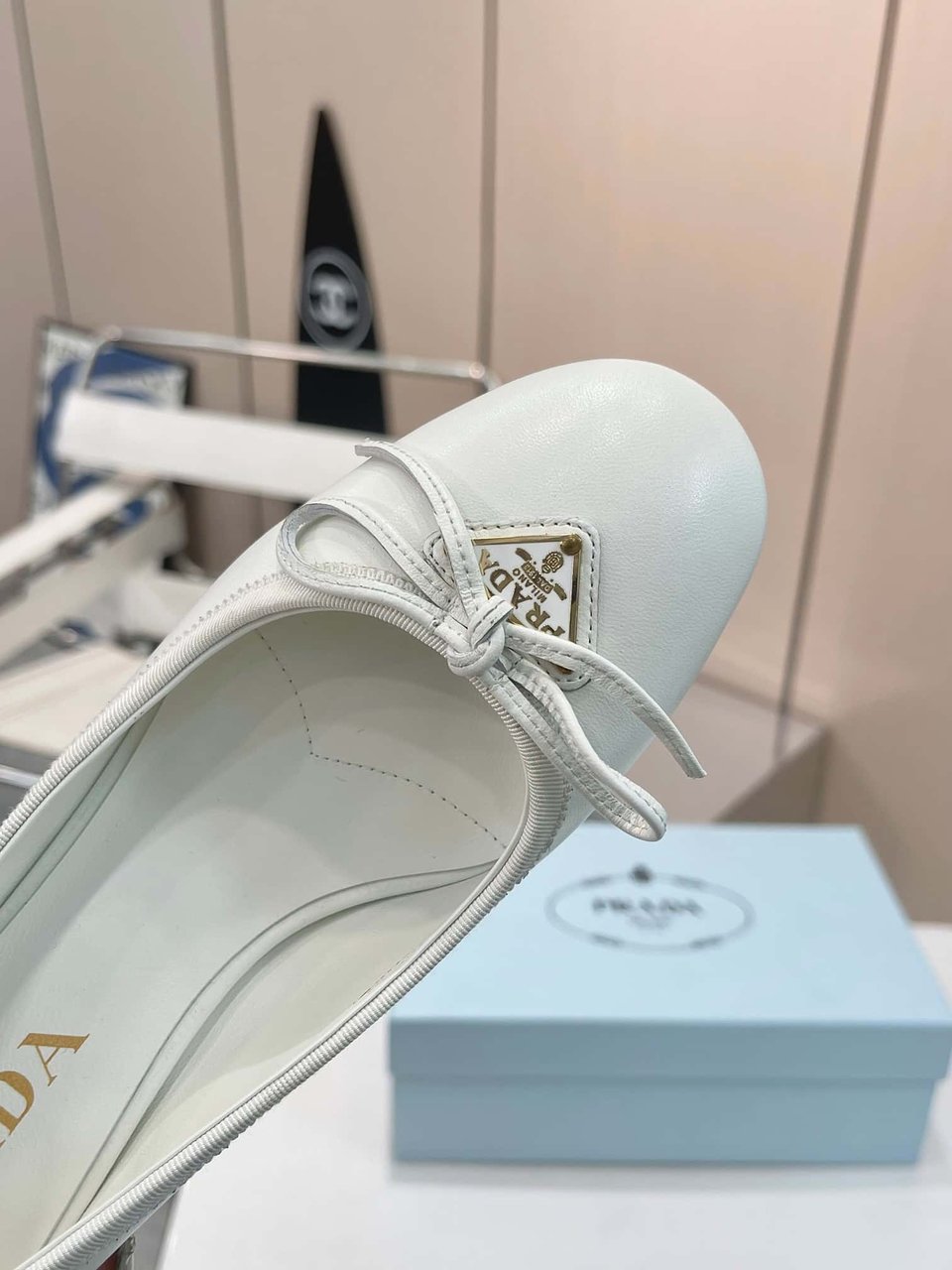 Prada Triangle Logo Bow Pump In White view 6