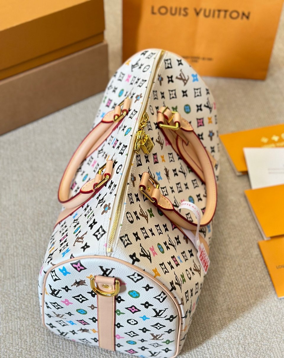 Louis Vuitton Keepall Bandouli Re Vanilla 40Cm M25233 view 6