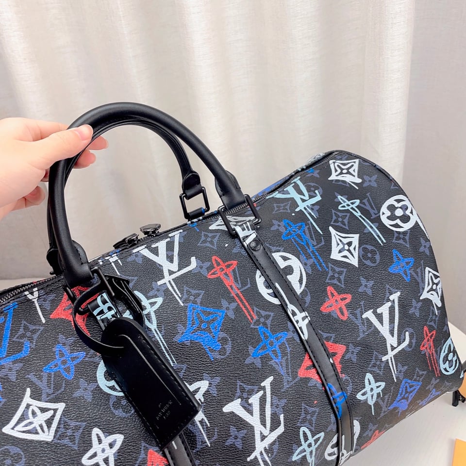 Louis Vuitton Keepall Bandoulieeere 50 Lv Graffiti Orange 50Cm M21384 view 9