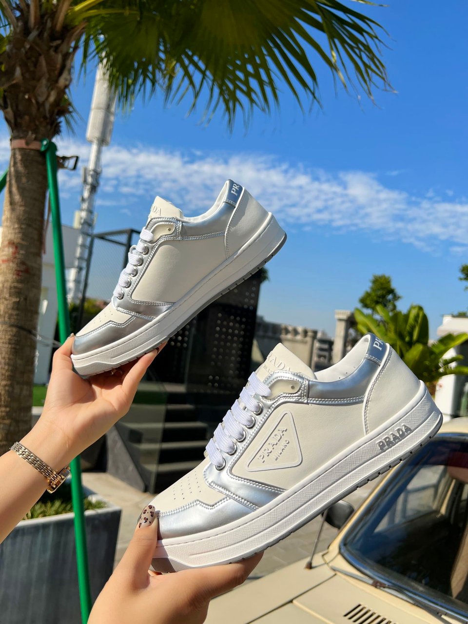 Prada District Perforated Leather Sneakers Sliver view 8