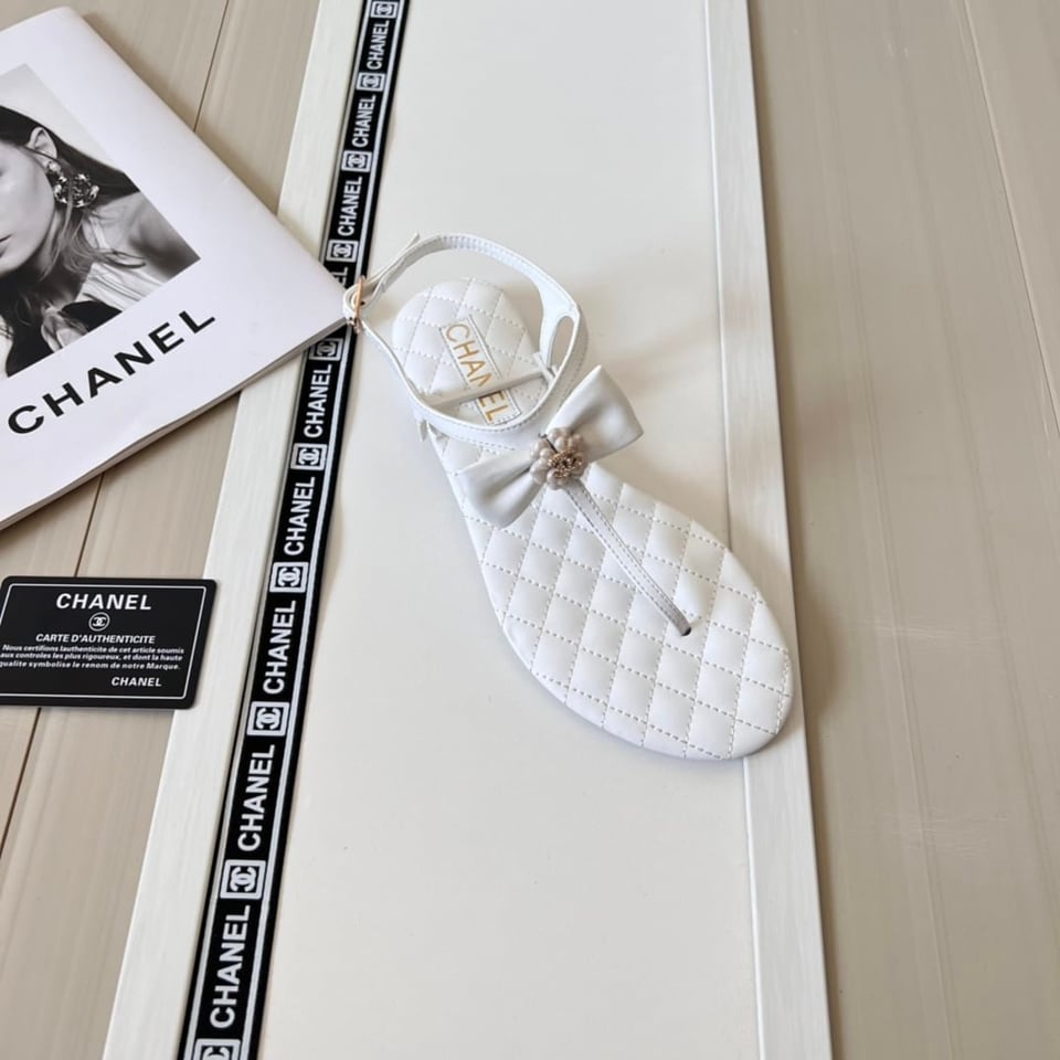Chanel White Quilted Leather With White Camellia Cc Logo Bow Thong Sandals view 8