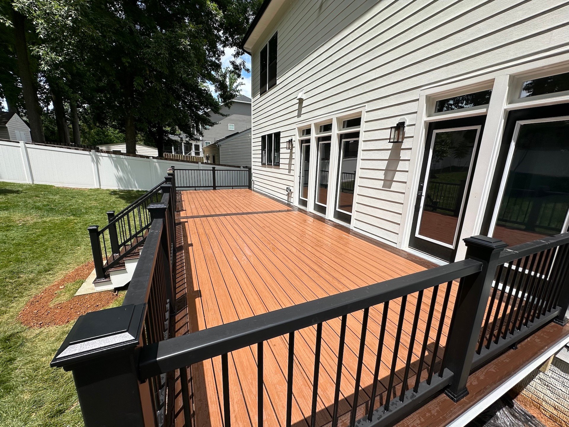 Upgryd custom deck featuring Trex composite railings in Breinigsville, PA.
