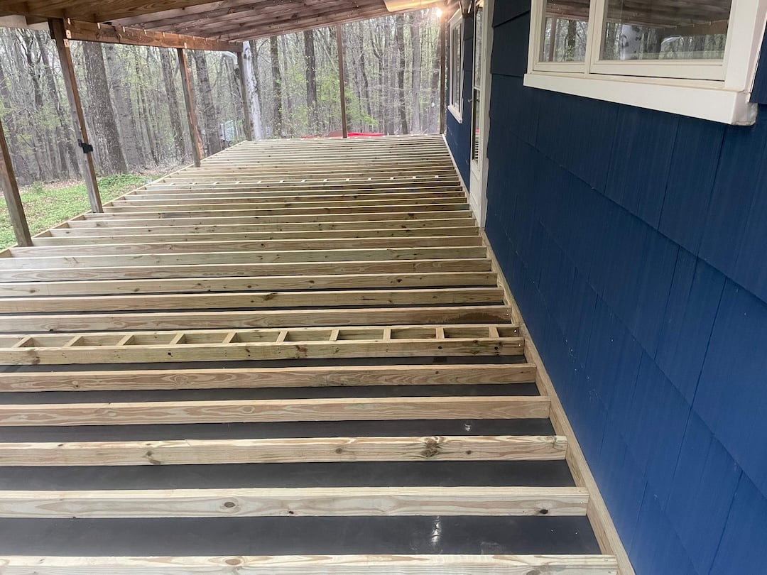 Upgryd is constructing a covered deck in Milford, NJ, showcasing quality craftsmanship and durable materials.