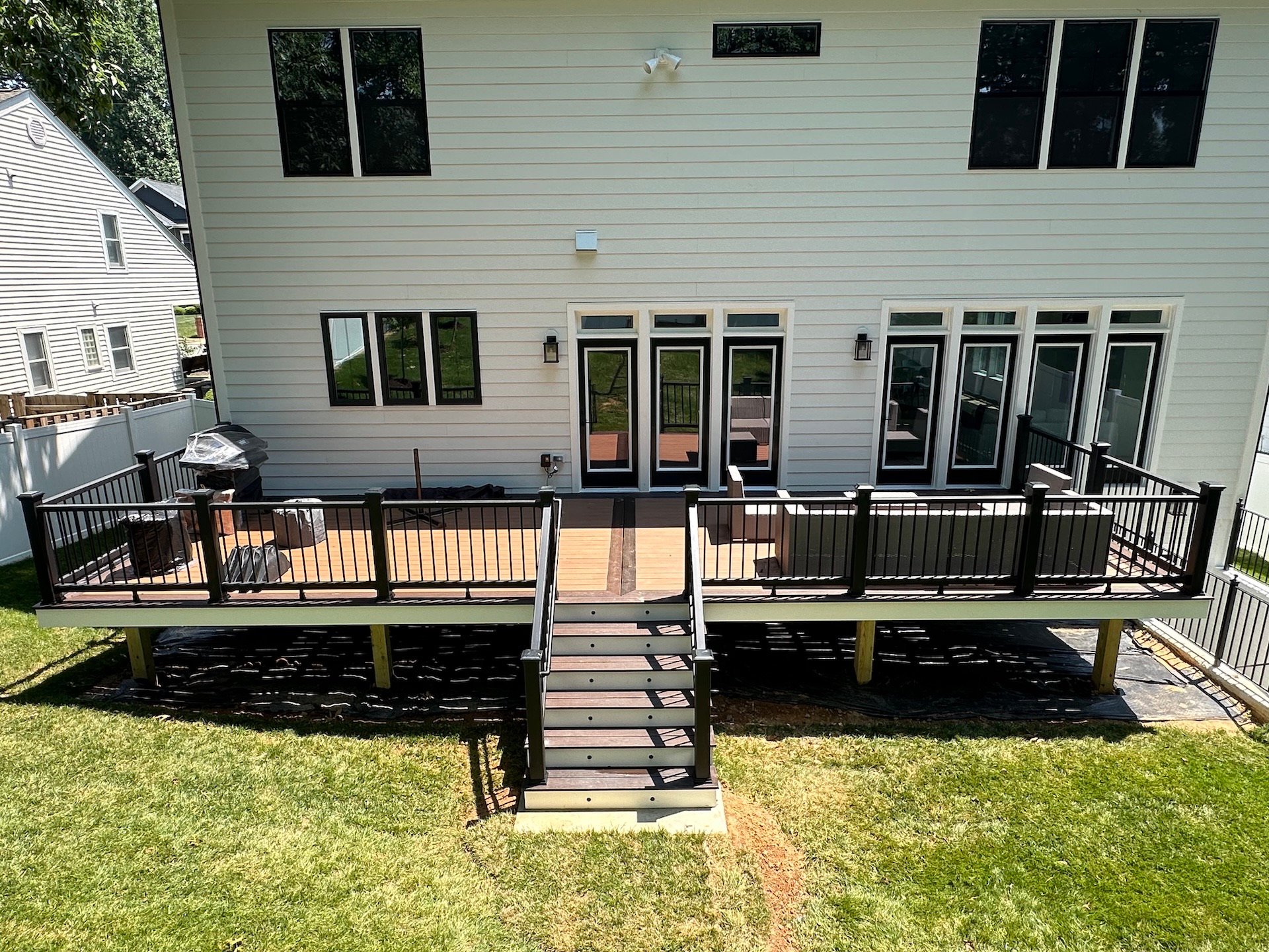 Upgryd custom deck design with a modern look, featuring premium decking materials.
