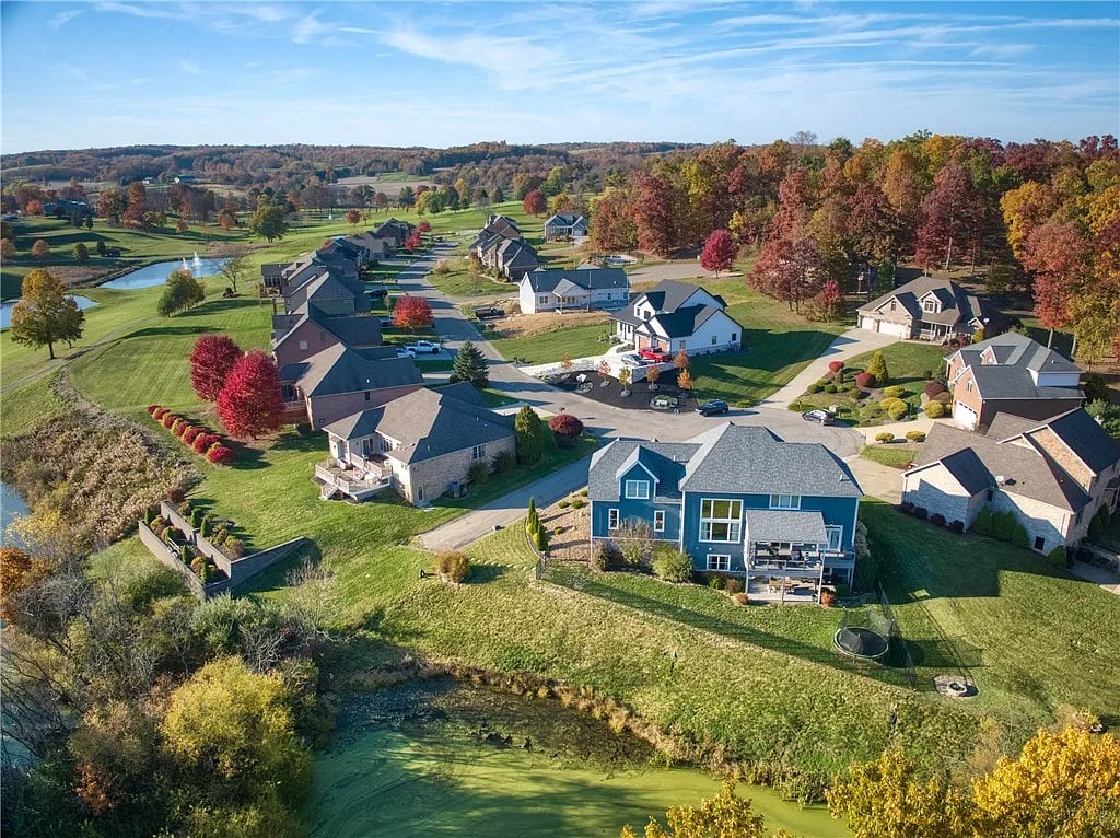 Aerial view of a backyard deck and surrounding neighborhood, designed by Upgryd in Pennsburg, Pennsylvania.