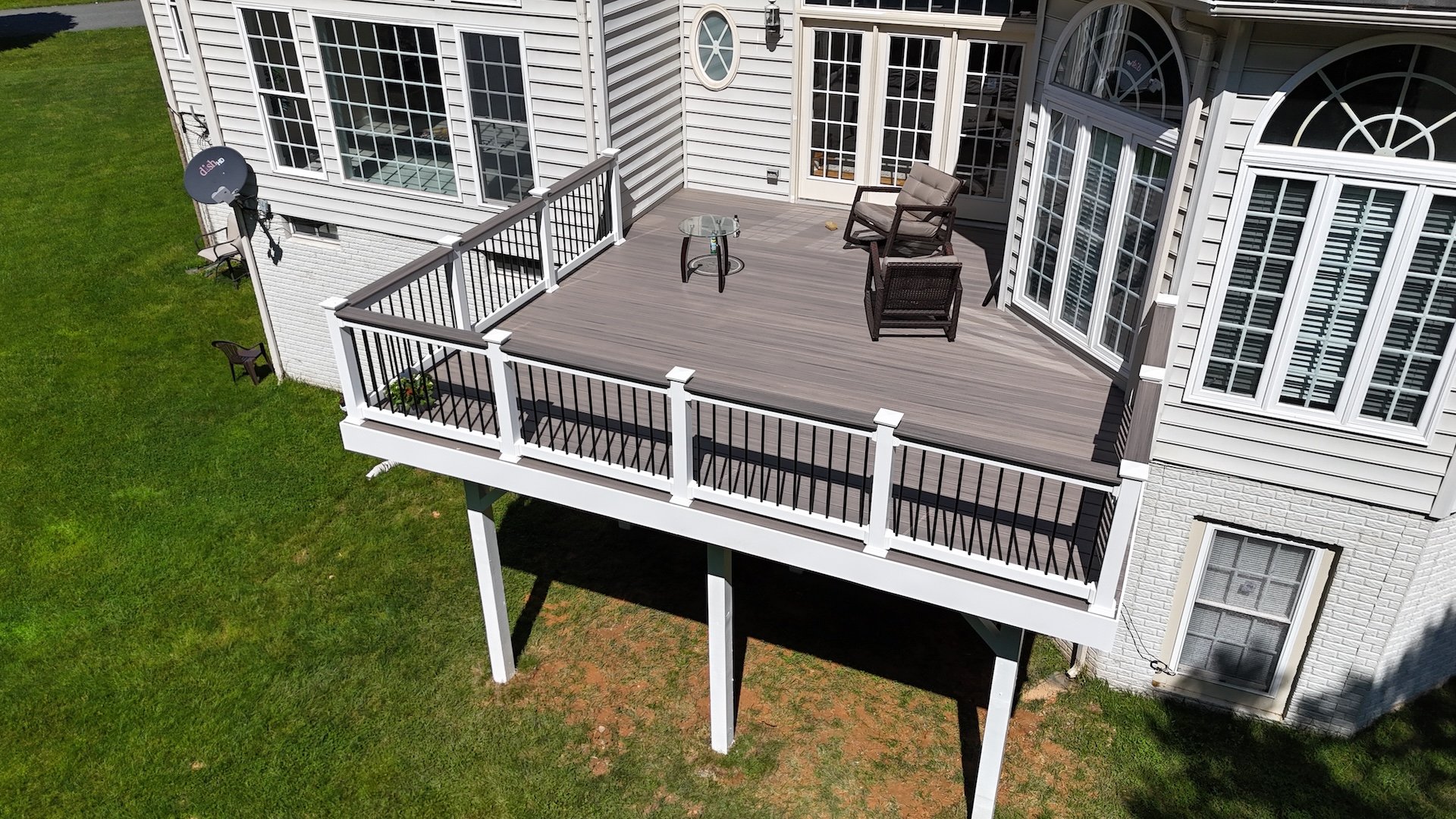 Aerial view of a new Trex Enhance Rocky Harbor deck with RDI Finyl Line Vinyl Railings in Bethlehem, PA by Upgryd.