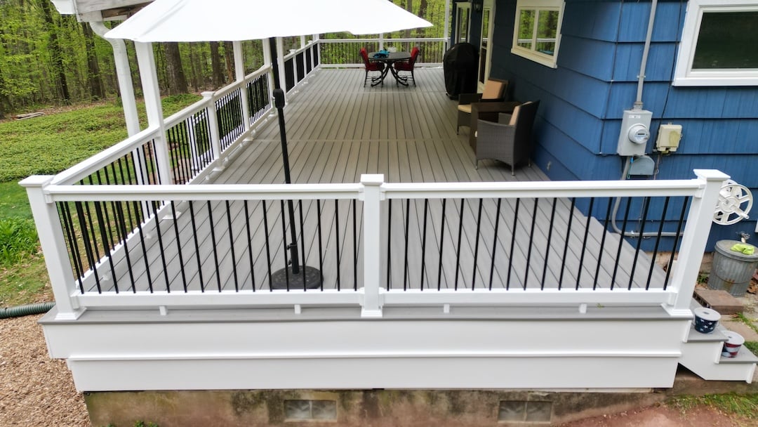 Upgryd deck side view in Milford, NJ, showcasing a beautifully crafted outdoor living space.