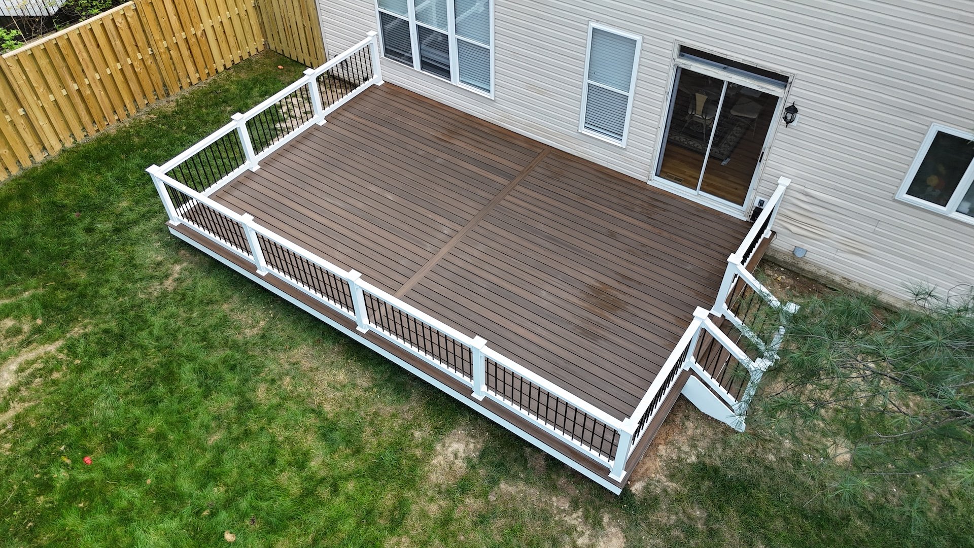 Elegant Deckorators Voyage Khaya deck in a backyard in Nazareth, PA