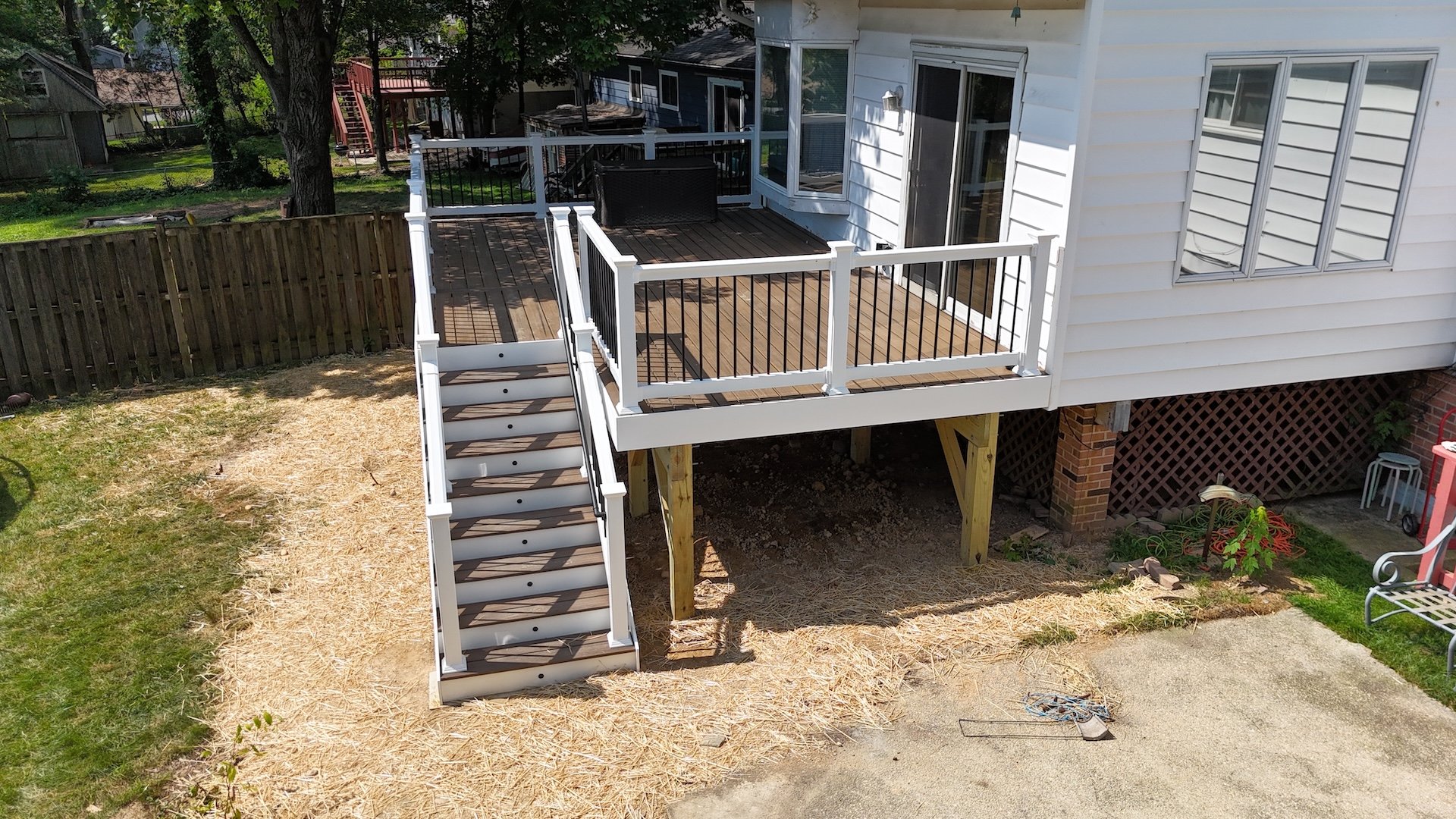 Upgryd's custom deck installation featuring a deck railing and staircase.