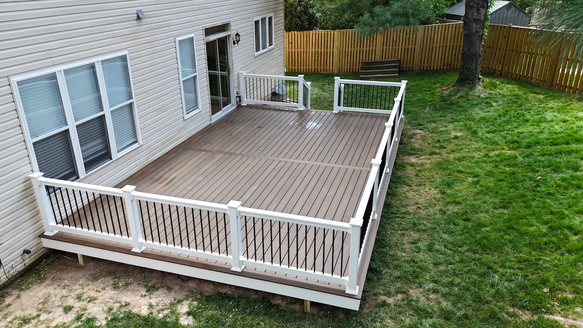 Upgryd custom deck with railing in Nazareth, PA, built with high-quality decking materials.