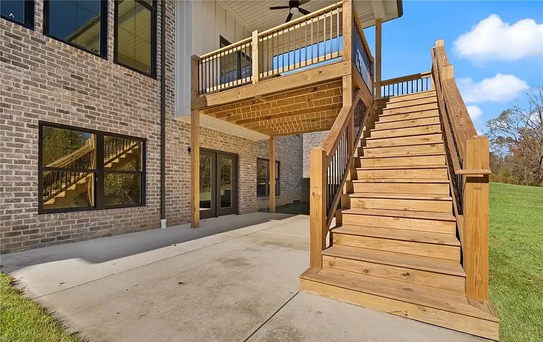 Upgryd custom deck with a covered deck and backyard view in Coopersburg, PA.