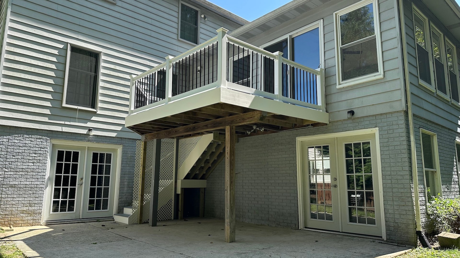 Upgryd deck resurfacing project featuring PVC fascia and Trex Select decking.