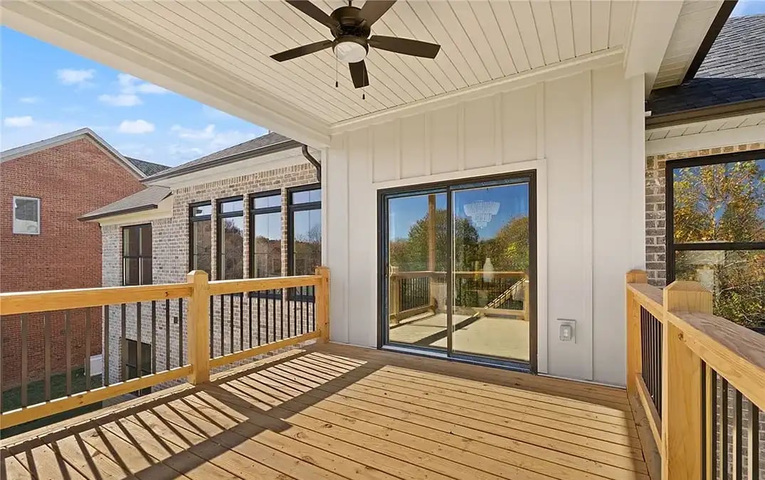 Upgryd covered deck with a ceiling fan in Coopersburg, PA, a beautiful outdoor living space designed and built by Upgryd, featuring a covered deck with a ceiling fan, perfect for enjoying the outdoors in comfort and style.
