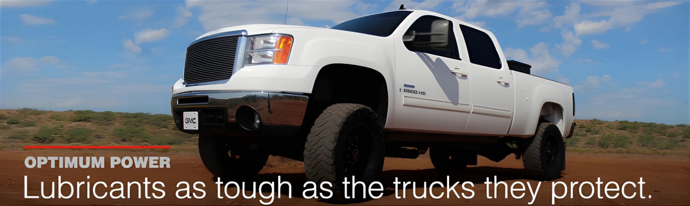 An image of a white modified HD pickup truck. AMSOIL and Fleece Performance Engineering offer quality full synthetic diesel lubricants that are as tough as the trucks they protect.