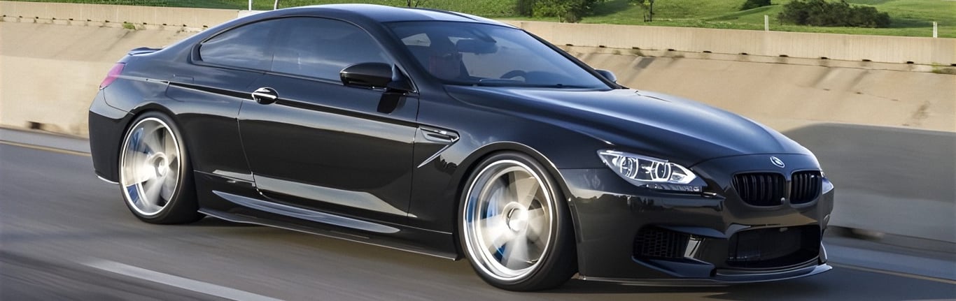 An image of a gorgeous black BMW sedan. A luxurious European automobile. Choose AMSOIL top-tier 100% synthetic European Motor Oil to protect your expensive investment. An engine oil you can trust and depend on!
