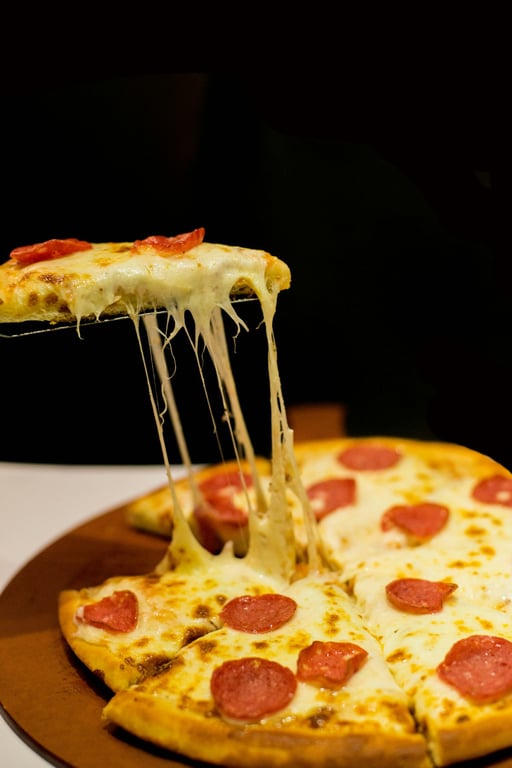 Pizza and wine set for a long-table dinner evening