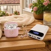 Hudobný balíček na cesty: 1x silikónový obal na AirPods 4 + 1x 20 000 mAh powerbanka s LED 1