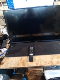Thomson 32HT2S35 32 colos HD Smart TV TiVo rendszerrel, Wi-Fi, Dolby Audio — hiányzó talpak, karcos képernyő (állapot: lásd a 2. képet) 2
