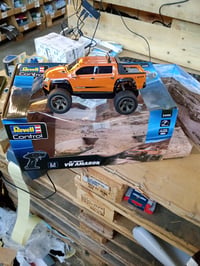 Mașină cu telecomandă Revell Control 24456 RC Truggy VW Amarok — defectă, funcționează parțial: nu virează la stânga (stare: vezi a doua fotografie) 6