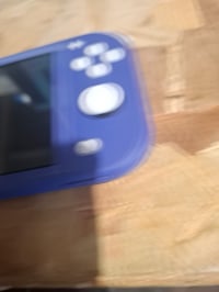 Nintendo Switch Lite Kék - Hordozható Játékkonzol Gyerekeknek — hibás, alkatrésznek: törött kijelző, nem működik (állapot: lásd a 2. képet) 3